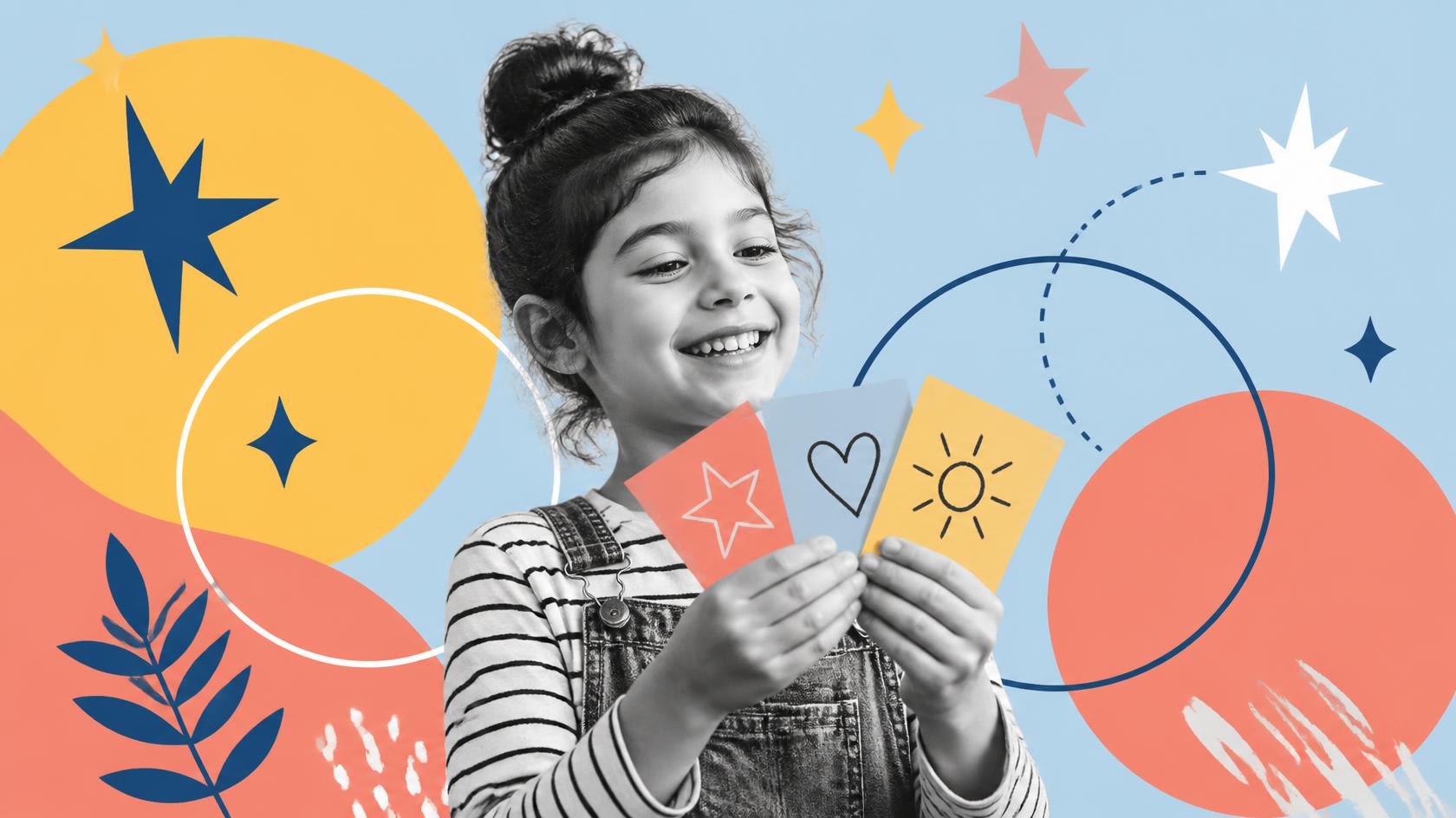 child smiling broadly and looking confidently at small cards they are holding